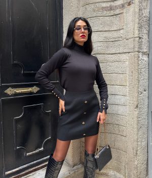 plain turtleneck knit sweater with gold button cuffs front view