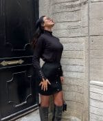 black knit turtleneck sweater with gold detail sleeves