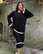 women’s black knitwear set with cream trim