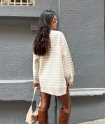model styling striped knit crew neck sweater with side slits