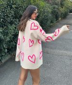 long sleeve drop shoulder sweater with heart pattern