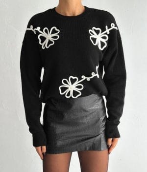 Embroidered Floral Crew Neck Sweater with white flower details on black knit fabric
