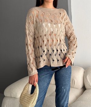Beige open knit sweater with wave pattern