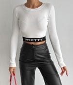 White ribbed knit crop top with black logo waistband for women