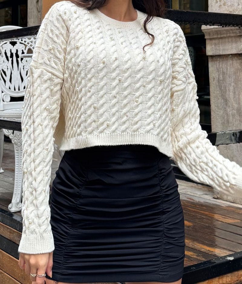 long sleeve off white knit sweater with pearl accents