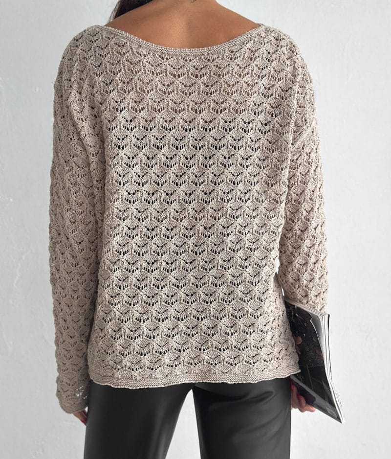 close-up of chevron open knit texture on sweater