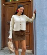 women’s off-white knit cardigan with wooden buttons