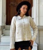 beige knit sweater with collar and gold buttons