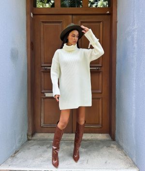 model wearing pearl detail knit sweater dress in winter style