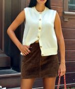 casual sleeveless knit cardigan styled with skirt