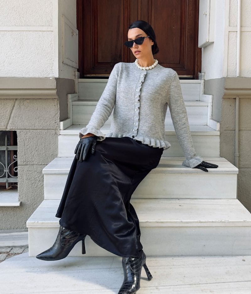 elegant knitwear cardigan with ruffle hem