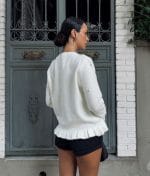 long sleeve embellished knit top with ruffle cuffs