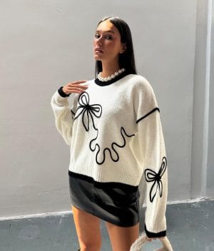Women’s knit sweater with black bow embroidery – crew neck style