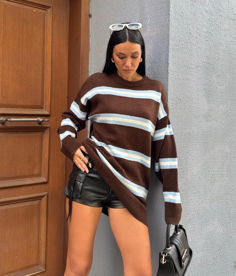 Striped crewneck knit tunic featuring soft texture and crew neckline
