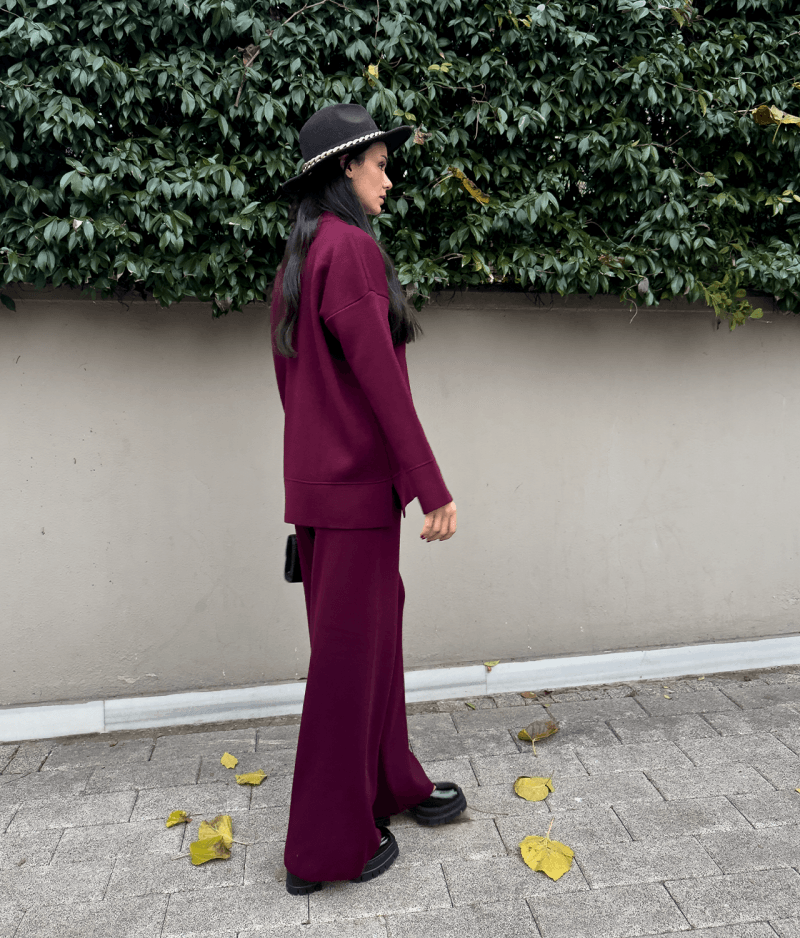 Minimal knit two piece set featuring long sleeve top and wide leg pants