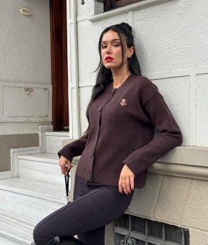 Embroidered teddy knit cardigan with button front design