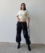 Classic cable knit pullover short sleeve editorial shot
