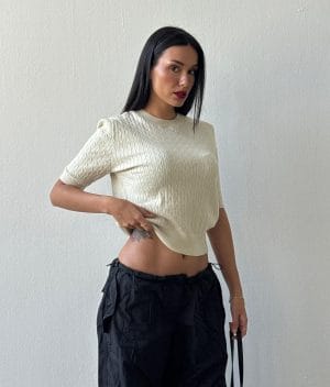 Short sleeve cable knit sweater close-up pattern
