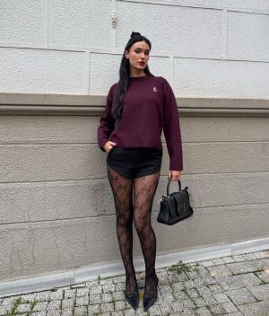 Women’s embroidered teddy knit sweater featuring a clean silhouette