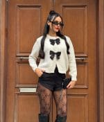 Bow detail knit cardigan with a soft and feminine front design