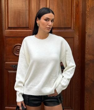 Women’s soft knit crew neck sweater featuring a smooth knit texture