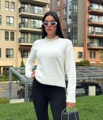Soft crew neck knit sweater with clean and minimal silhouette