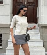 Floral embroidered knit top designed for feminine wholesale collections