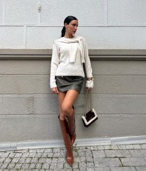 Women’s tied shoulder layer knit sweater featuring a layered knit design