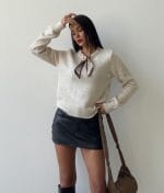 Women’s scarf detail knit sweater featuring a refined crew neckline