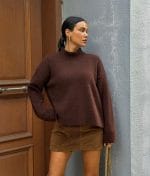 Women’s mock neck knit sweater featuring a clean and modern silhouette