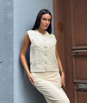 Embroidered Floral Knit Vest textured floral knitwear on model