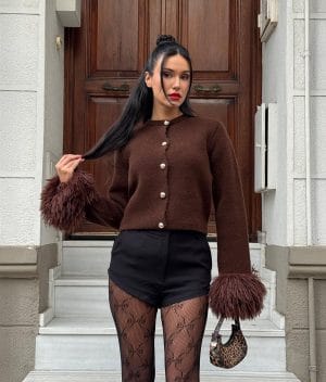 Feather cuff knit cardigan with statement sleeve detail and button front