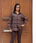 Classic plaid button-up shirt with long sleeves and relaxed fit