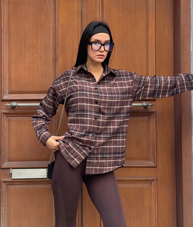 Brown plaid button-up shirt styled for everyday wear