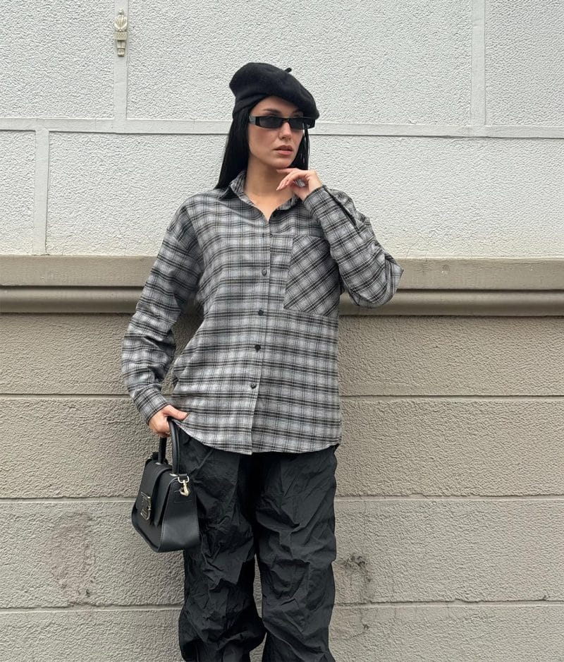 Grey plaid button up shirt styled for everyday wear