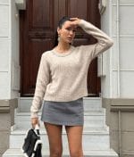 Elegant knit sweater with decorative crystal neckline detail