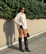Tiered cotton shirt dress close-up showing buttons and soft gathered tiers