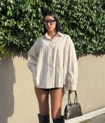Tiered cotton shirt dress front view with long sleeves and collared neckline