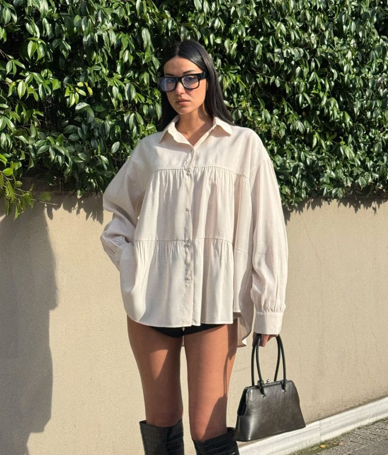 Tiered cotton shirt dress front view with long sleeves and collared neckline