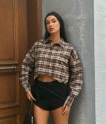 Cropped plaid woven shirt styling shot on model