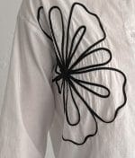 breathable cotton shirt abstract floral detail close up