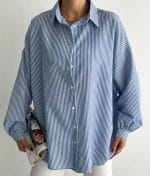 Loose fit striped button down shirt oversized silhouette