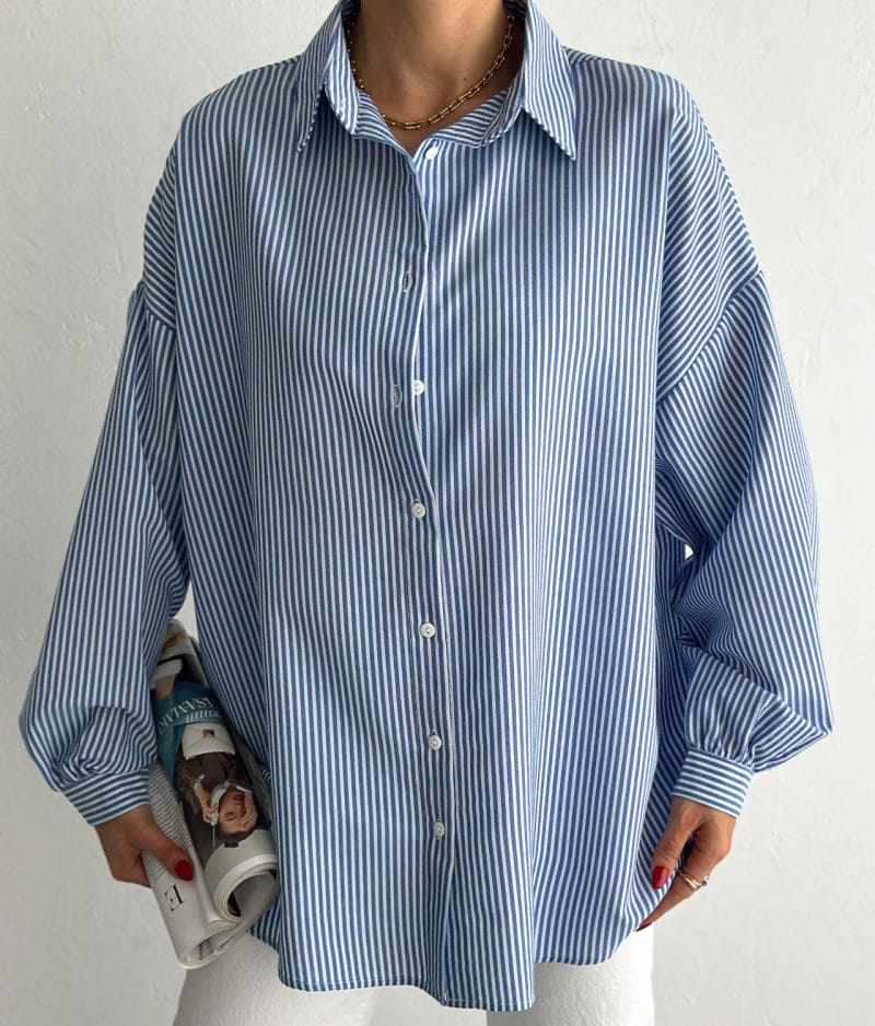 Loose fit striped button down shirt oversized silhouette