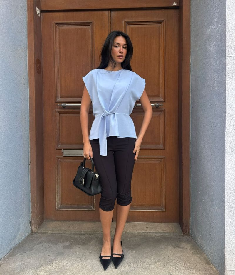 sleeveless draped blouse back view fitted shape
