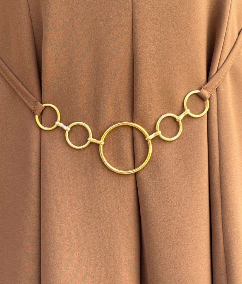 belted mini dress waist detail chain close up