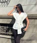 belted wrap blouse front view