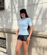 ribbed knit top with scallop trim detail