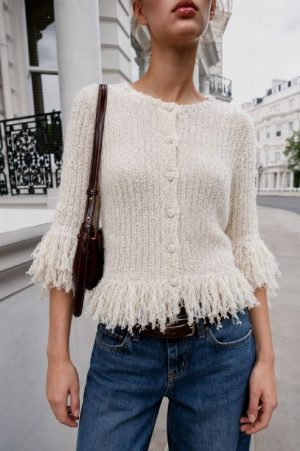 Fringe trim knit cardigan close up